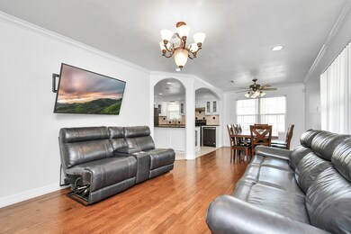 Step inside to find your spacious living room, featuring an open and airy atmosphere. This gorgeous hardwood flooring seamlessly extends to your dinging area.