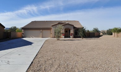 Concrete Driveway leads to Home