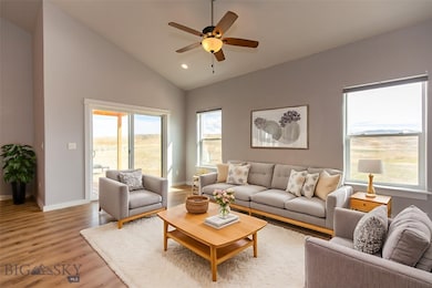 Living area with vaulted ceilings. virtual staging