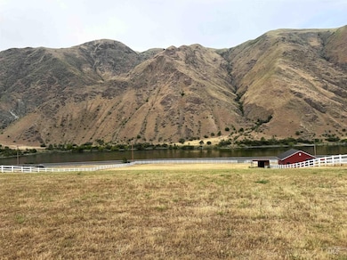 View of mountain backdrop with a large body of water