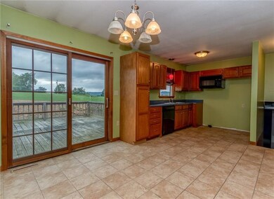 Eat In Kitchen Area with sliders to deck and lovel