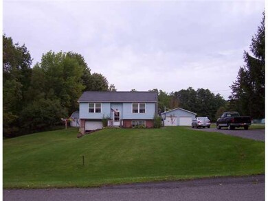 Exterior Front FEATURES 2 CAR DETACHED GARAGE AND 