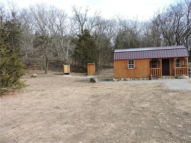 Shower house and powder room next to cabin