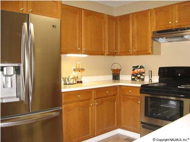 New Flooring and Stainless Steel appliances in the kitchen.