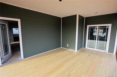 Side Porch w/ wood flooring