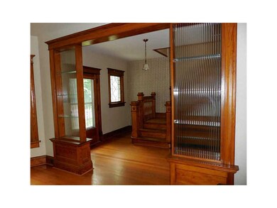 . Living room ~ looking to foyer and staircase.