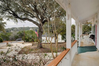 Balcony with a ceiling fan and a porch