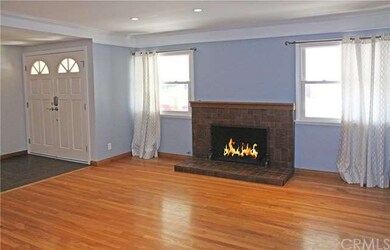 Formal living room with REAL hardwood floors.  Add