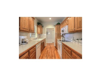 Hardwood Floors, lots of counter space with Breakf