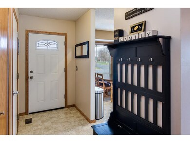 Wide entryway includes updated front door as well 