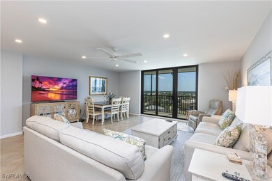 Living area featuring tile patterned flooring, recessed lighting, a ceiling fan, and baseboards