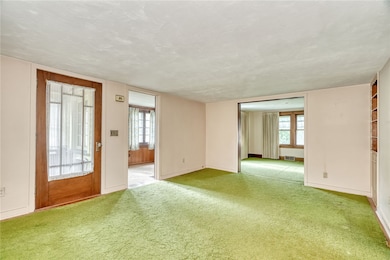 #900-FORMAL LIVING ROOM **hardwoods under carpeting