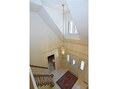 Entry/Foyer. The view from the upper level shows t