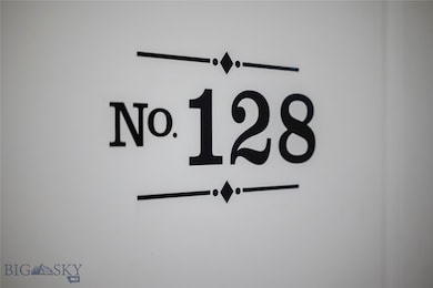 Unit 128 is the first door on the right on the thi