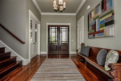 ENTRY HALL WITH WALNUT FLOORING