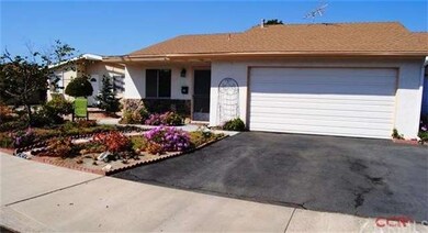 Low maintenance yard and spacious driveway.