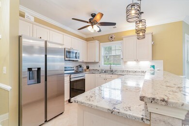 Kitchen featuring sink, stainless steel appliances