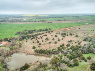 Birds eye view of property featuring a rural view 
