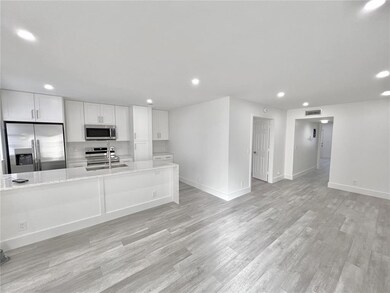 VIEW FROM ENTRY DOOR: LEFT KITCHEN - RIGHT LIVING