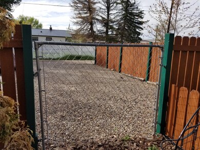 Gravel parking area  off of alley