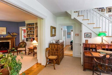 Bright sunny rooms flow into each other.