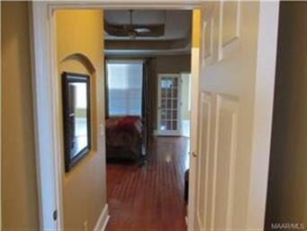 HALLWAY LEADING FROM MASTER BATHROOM TO MASTER BED
