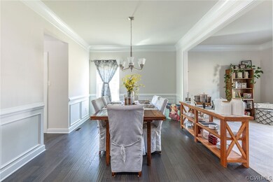 Formal Dining Room with hardwood flooring