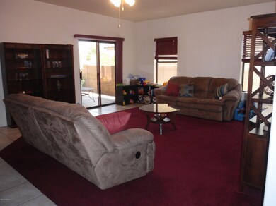 living room with sliders to covered pati