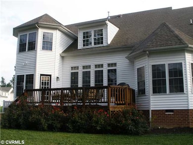 Exterior Back - Back yard is large enough for a ga