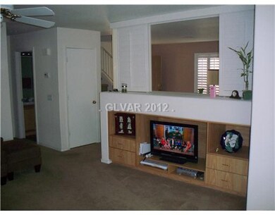 Den. Family room with movable room divider above e