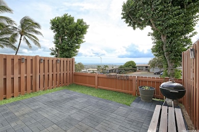 Low maintenance back yard with ocean view.