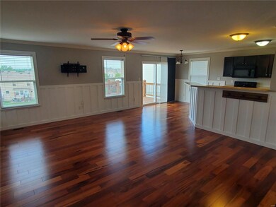 View from the living room looking into the kitchen and breakfast room.