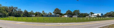 The lot as see from the east side of 20th St. The street is in the City Limits according to the Property Appraiser's website.