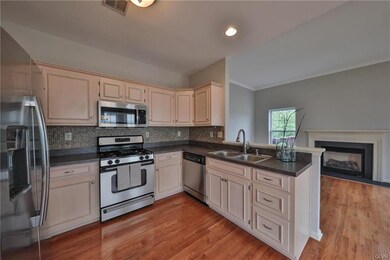 Stainless Steel Appliances, Tile Back splash, Open Flr plan