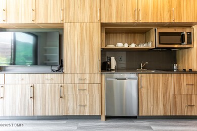 TV and kitchen wall