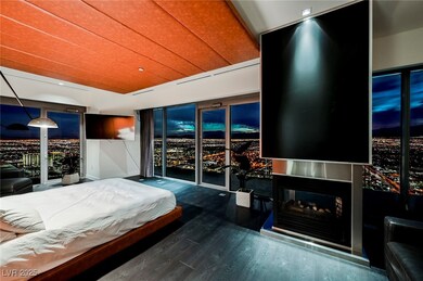 Bedroom with multi sided fireplace