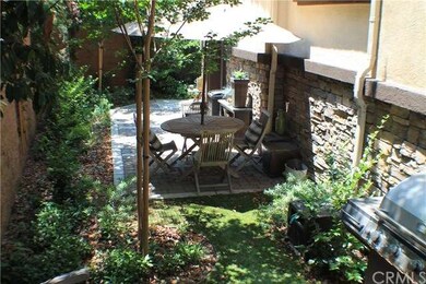 Beautiful and serene front yard with pavers.