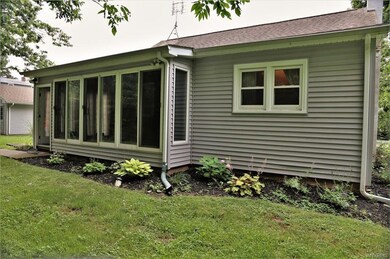 Rear elevation-Sun room, windows are sliders.