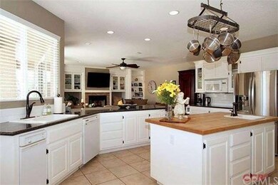 Ã¢â‚¬Â¢Granite counters in kitchen, white cabinets