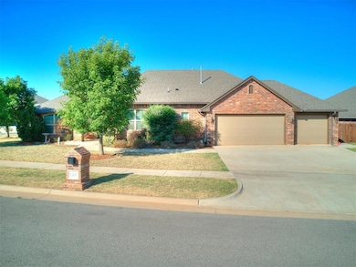 View of front of property with a garage and a fron