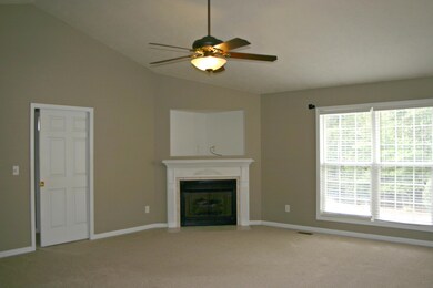 LR from foyer to fireplace
