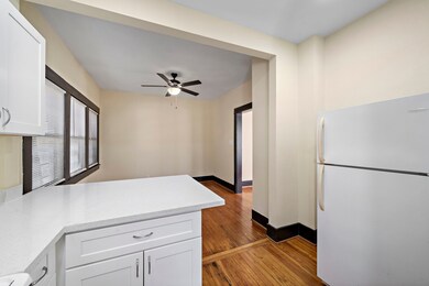 Standing in Kitchen, looking at Dining area (or you can set up your office in here - flexible space!)