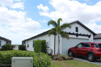 View of side of home featuring stucco siding, conc