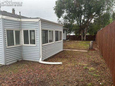 View of fenced backyard