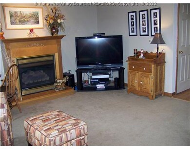 Den/Family/Great Room. Fireplace with gas logs.