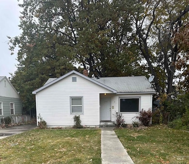 Bungalow-style home featuring a shingled roof