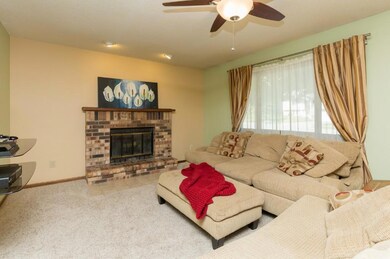 Natural wood burning fireplace w/brick surround & 