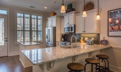 Kitchen with counter height bar seating.