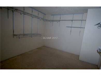 Master Bedroom. walk in closet the size of most be