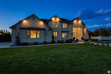 View of front of house featuring stucco siding